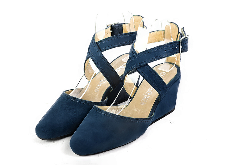 Navy blue women's open back shoes, with crossed straps. Round toe. Medium wedge heels. Front view - Florence KOOIJMAN